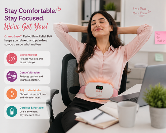 "Happy woman working in an office while wearing CrampEase™ Period Pain Relief Belt, enjoying heat therapy and massage for menstrual cramp relief."